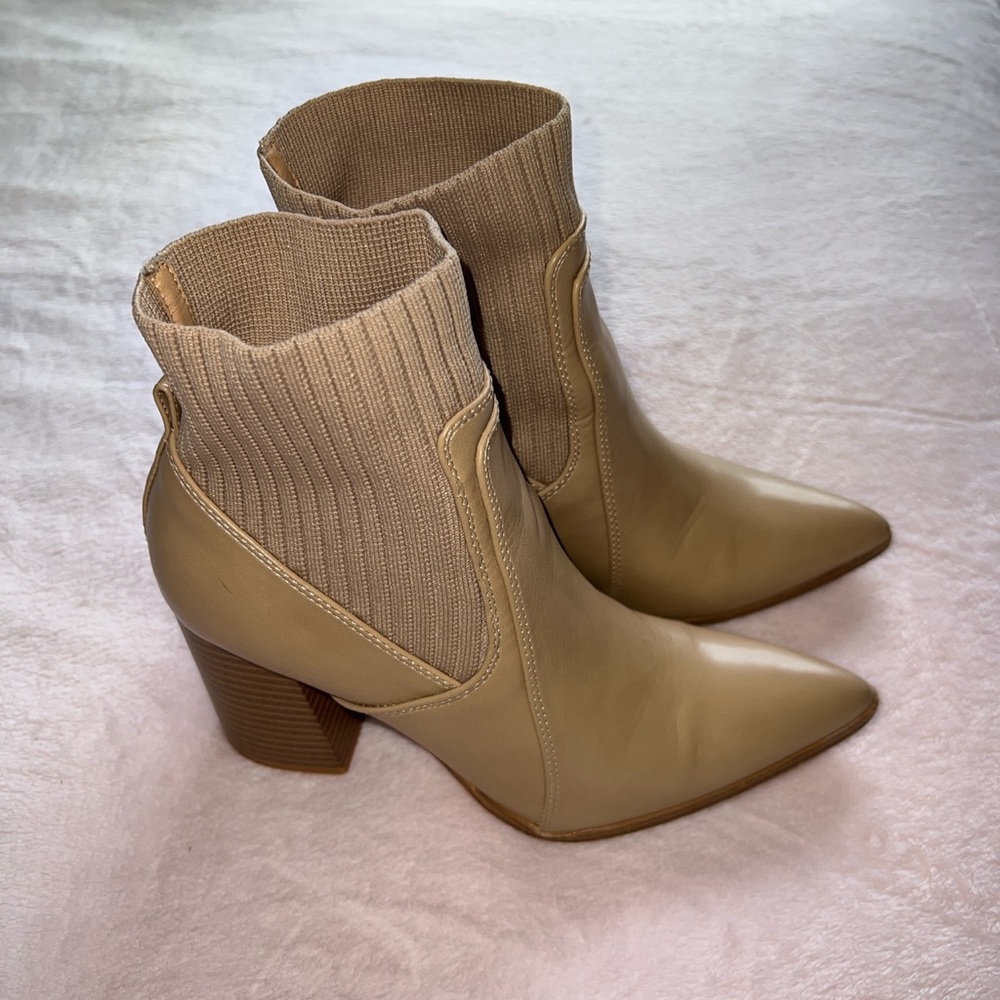Tan sock boots.